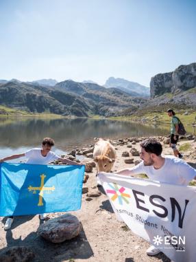 Volunteers posing with a cow in the Covadonga Lakes